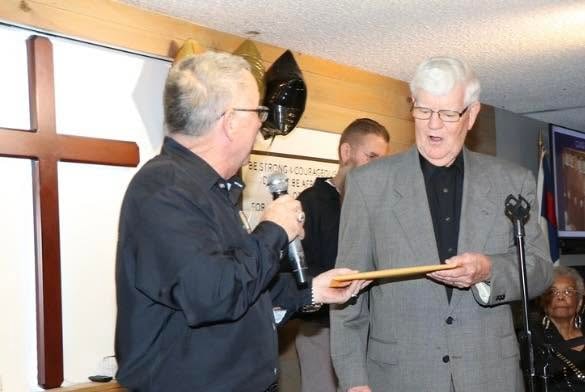 Jess Lewis was presented an honorary Doctor of Divinity degree